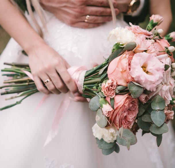 the-bridegroom-embraces-the-bride-s-waist-2022-02-02-03-49-13-utc.jpg